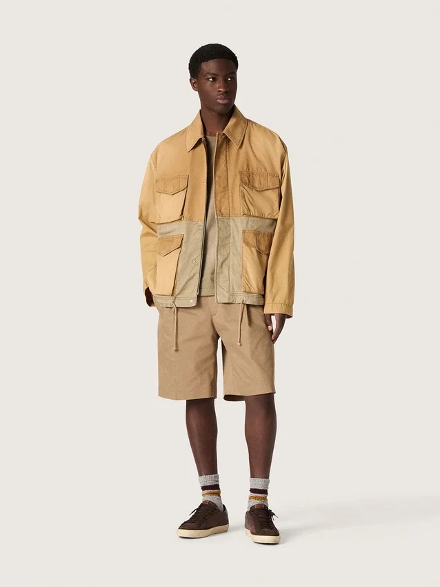 Unisex safari jacket in beige and military-green cotton with maxi pockets