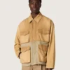 Unisex safari jacket in beige and military-green cotton with maxi pockets