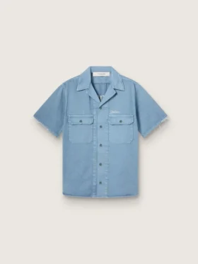 Unisex shirt in light blue denim with embroidery on the back