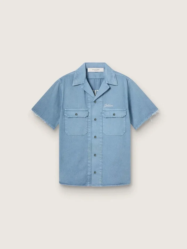 Unisex shirt in light blue denim with embroidery on the back