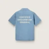 Unisex shirt in light blue denim with embroidery on the back
