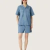 Unisex shirt in light blue denim with embroidery on the back