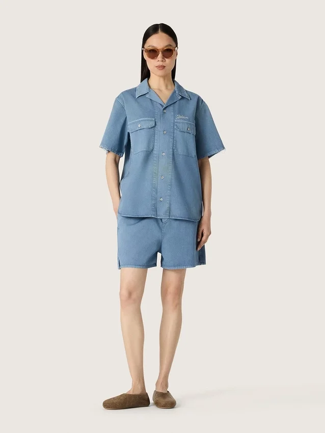 Unisex shirt in light blue denim with embroidery on the back