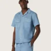 Unisex shirt in light blue denim with embroidery on the back