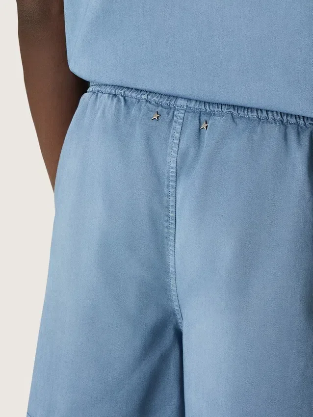 Unisex shorts in light blue cotton twill