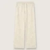 Unisex sweatpants in ecru and sand striped cotton and linen