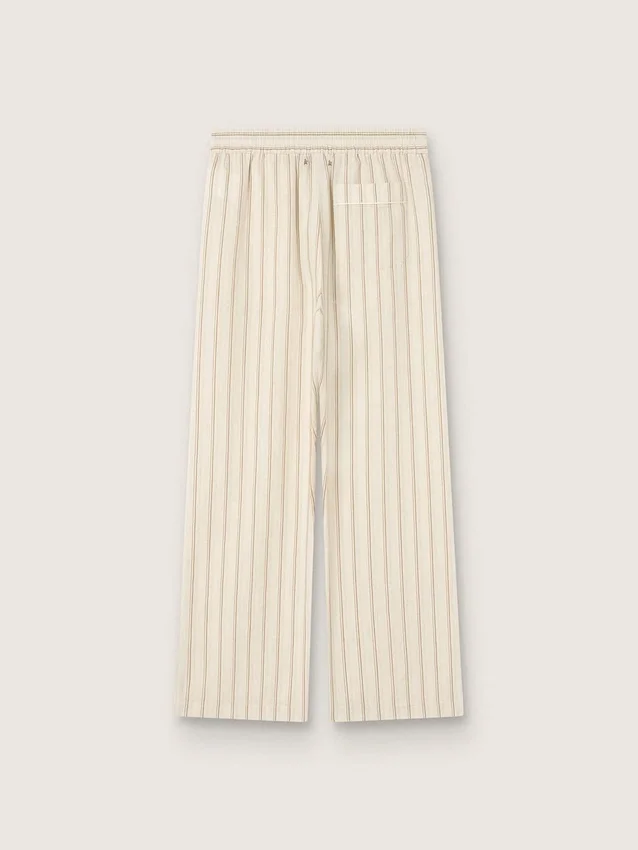 Unisex sweatpants in ecru and sand striped cotton and linen