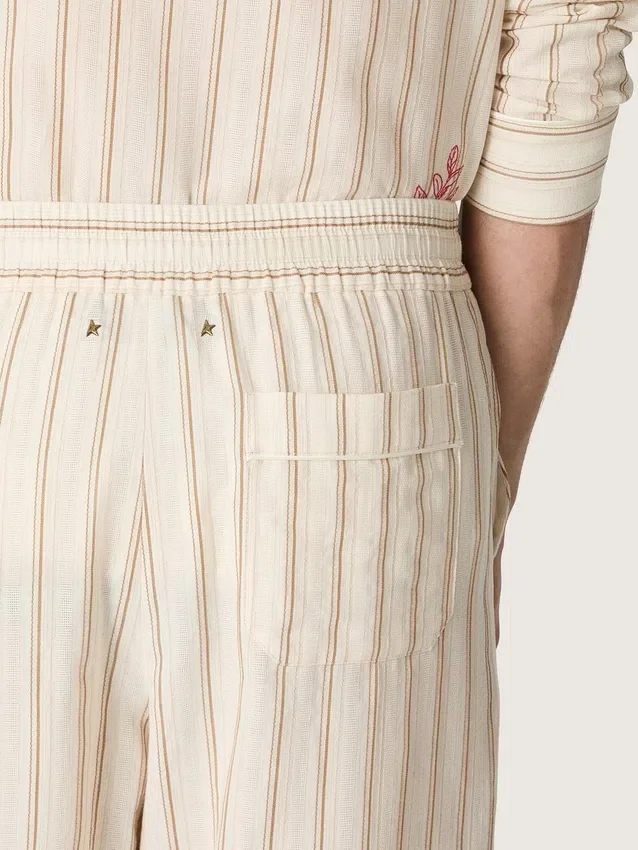 Unisex sweatpants in ecru and sand striped cotton and linen