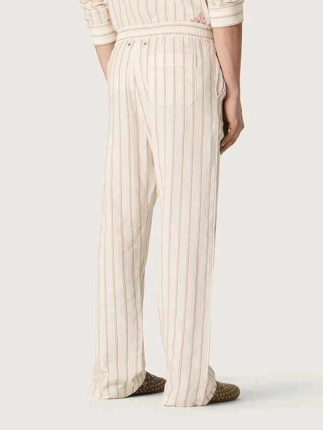 Unisex sweatpants in ecru and sand striped cotton and linen