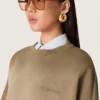 Unisex sweatshirt in military-green bleached-look cotton with embroidered logo