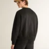 Unisex sweatshirt in worn black cotton with logo embroidery