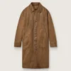 Unisex trench coat in brown waxed twill with leather details