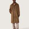 Unisex trench coat in brown waxed twill with leather details