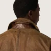 Unisex trench coat in brown waxed twill with leather details