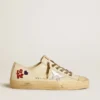 V-Star in ecru nappa with silver nappa star and beaded embroidery