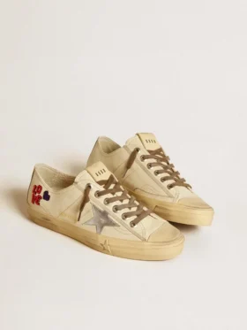 V-Star in ecru nappa with silver nappa star and beaded embroidery