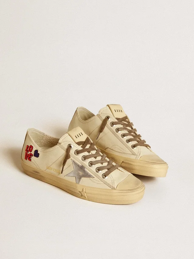 V-Star in ecru nappa with silver nappa star and beaded embroidery