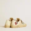 V-Star in ecru nappa with silver nappa star and beaded embroidery