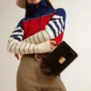 Venezia Bag in black boarded leather with gold details