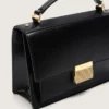 Venezia Bag in black boarded leather with gold details