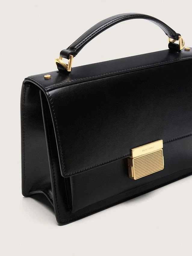 Venezia Bag in black boarded leather with gold details