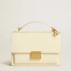 Venezia Bag in butter-colored boarded leather with double charm