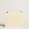 Venezia Bag in butter-colored boarded leather with double charm