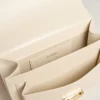Venezia Bag in butter-colored boarded leather with gold details