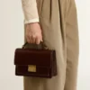 Venezia Bag in dark brown laminated leather with gold details