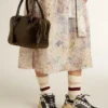 Vita Bag in black distressed leather with gold details