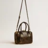 Vita Bag in black distressed leather with gold details