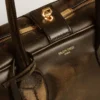 Vita Bag in black distressed leather with gold details