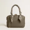Vita Bag in sage-green leather with gold details