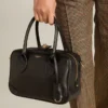 Vita Bag in smooth black leather with gold details