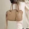 Vita Bag in taupe leather with gold details