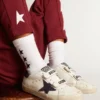 White socks with contrasting black stars