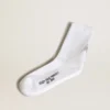 White socks with crystal star on the back