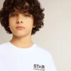 White T-shirt with contrasting black logo and star