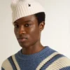 White wool beanie with black star