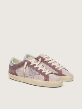 Woman’s Super-Star in pale pink suede with suede star and platinum heel tab