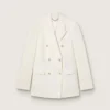 Women’s aged white double-breasted blazer