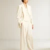 Women’s aged white double-breasted blazer