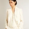 Women’s aged white double-breasted blazer