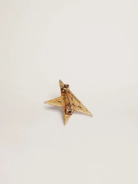 Women’s antique gold-colored brooch with decorative crystals