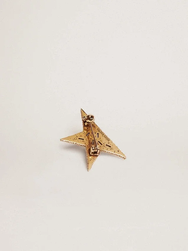 Women's antique gold-colored brooch with decorative crystals