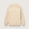 Women’s beige cardigan with 'Golden' lettering on the back