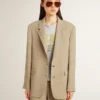 Women's beige pinstripe single-breasted jacket with an oversized fit