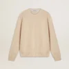 Women's beige sweater with 'Golden' lettering on the back