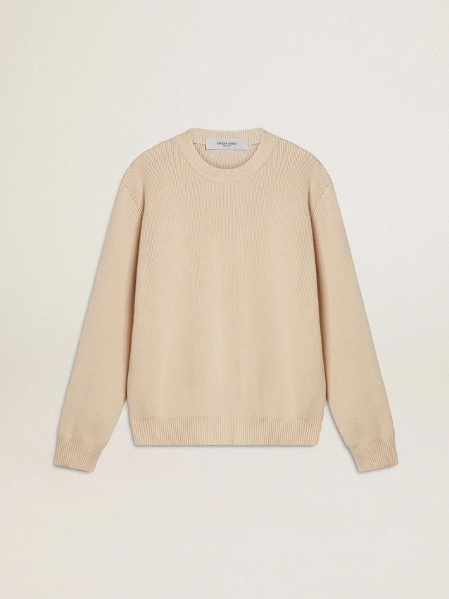Women's beige sweater with 'Golden' lettering on the back