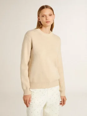 Women’s beige sweater with ‘Golden’ lettering on the back